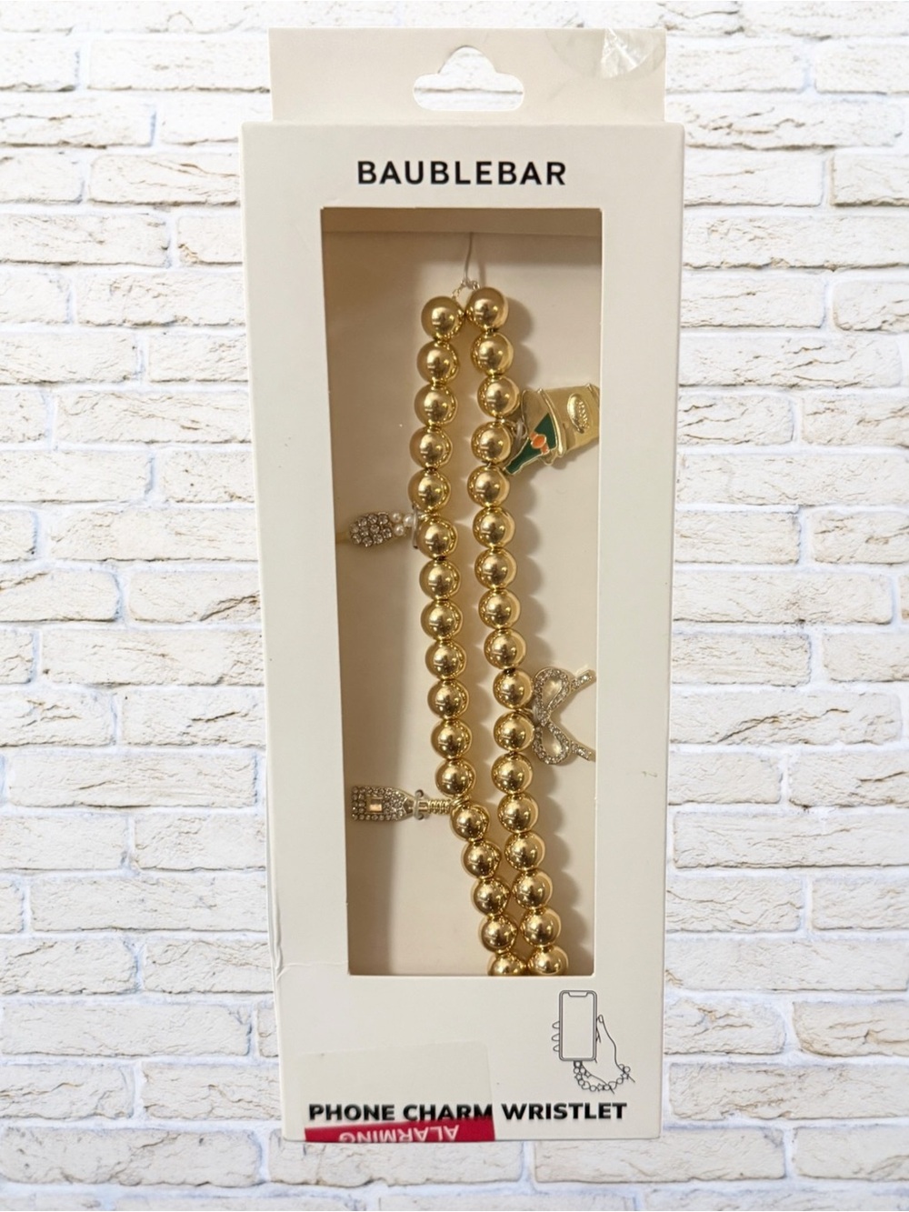 BaubleBar Gold Beaded Phone Charm Wristlet - Champagne and Celebration